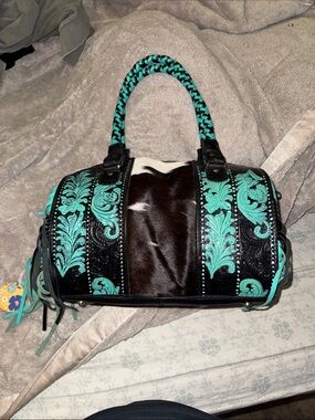 Turquoise and Black Cowhide soft speedy